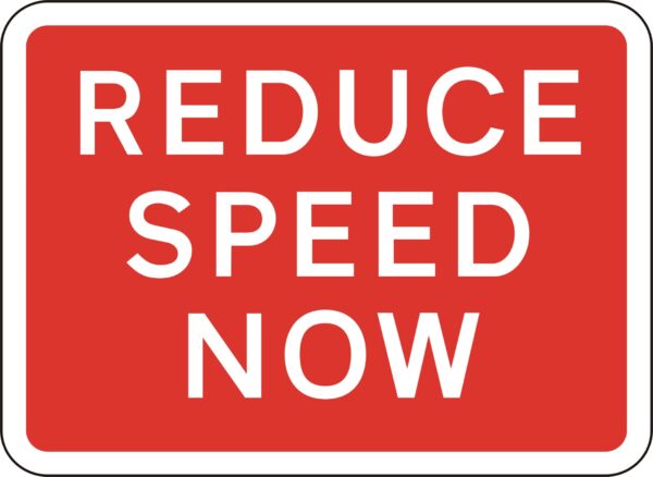 red reduce speed now road sign for sale