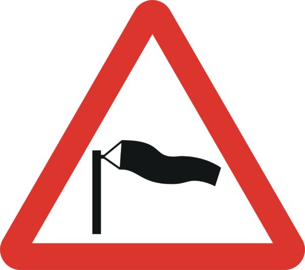 side winds likely in road ahead sign