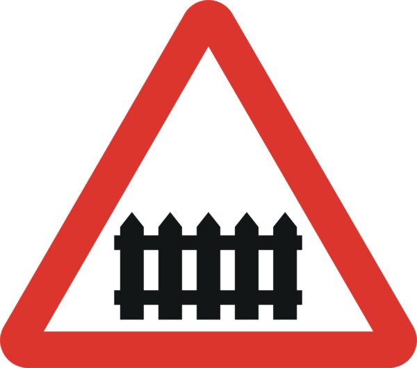 level crossing with gate or barrier ahead road sign level crossing sign