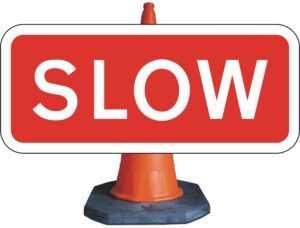 red slow road sign for sale